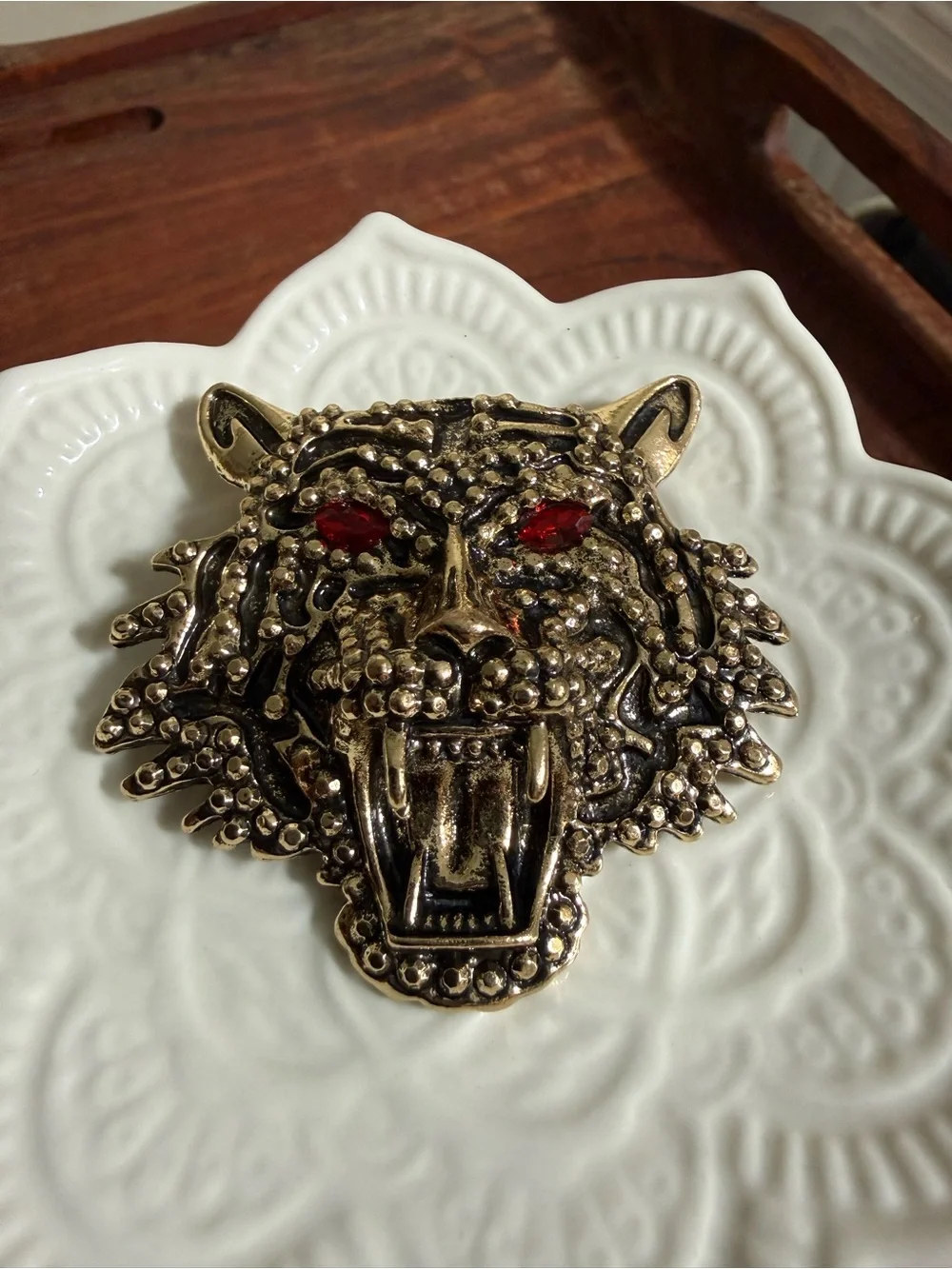 gold-tone metal roaring tiger head brooch red rhinestone eyes textured detail